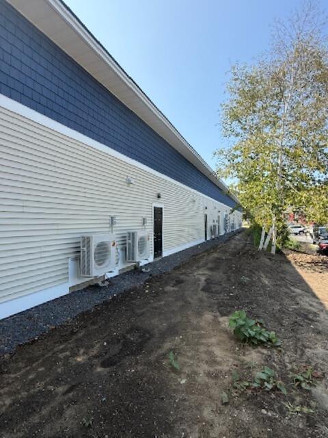 22 Laudholm Farm Road, Unit 7 Wells, ME 04090 - Photo 13 of 16 Exterior Back of Bay building
