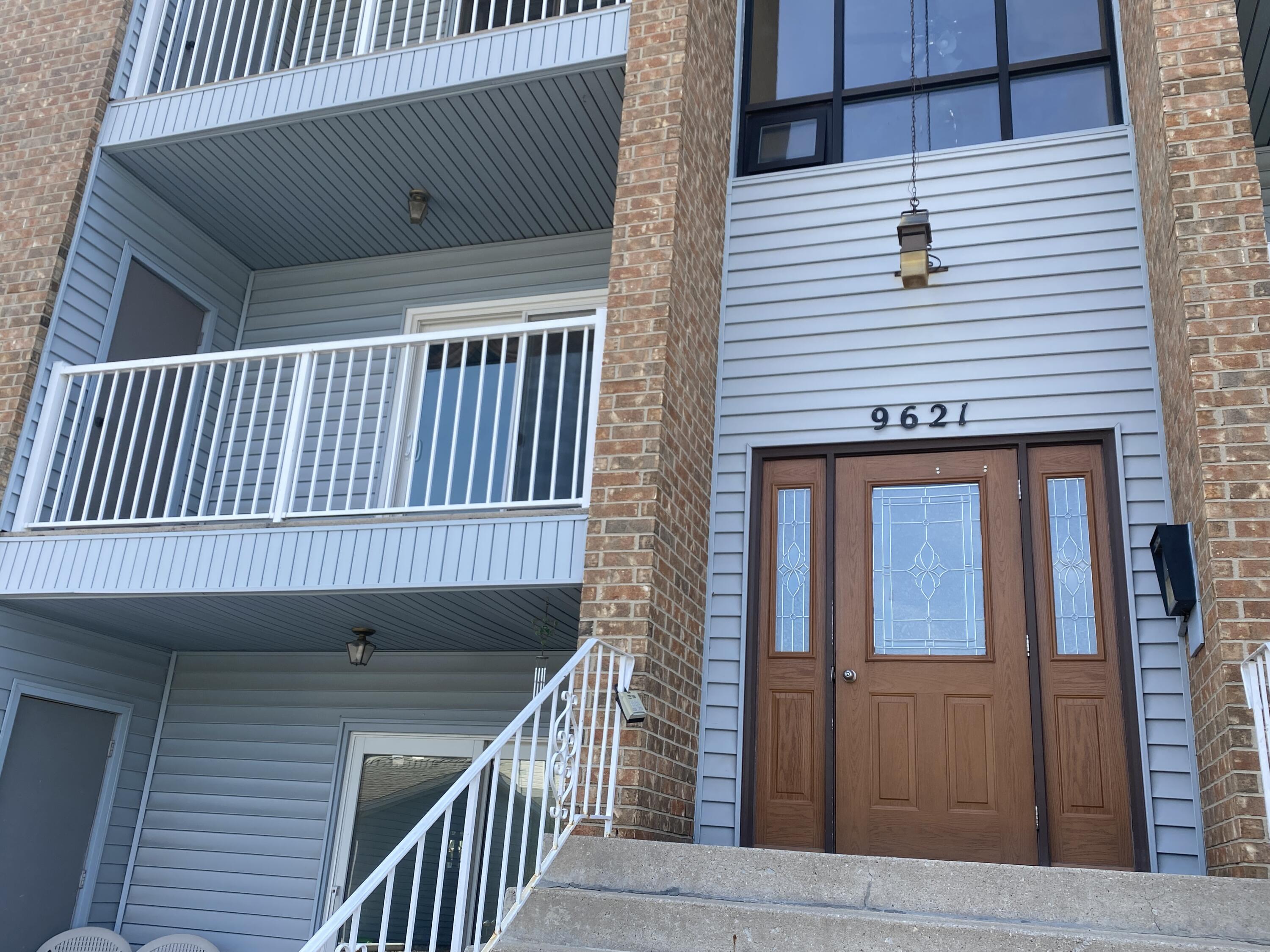 a view of a house with a deck