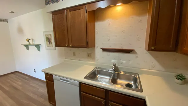 a bathroom with a sink and a cabinets
