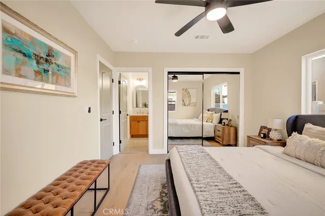 a view of a room with wooden floor