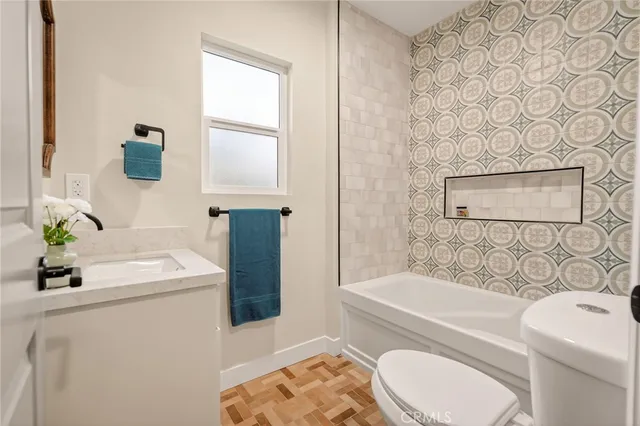 a bathroom with a sink and a bathtub