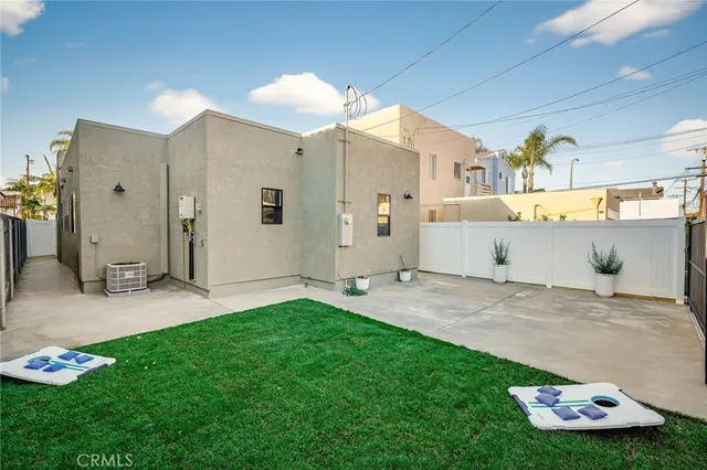 a view of a back yard of the house