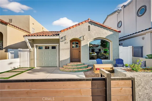 a view of a house with a sink and outdoor dining
