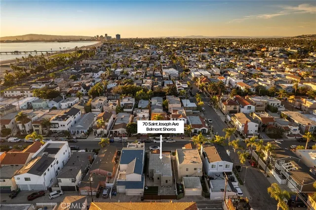 an aerial view of residential building with parking space