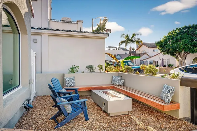 a workspace with furniture and a potted plant
