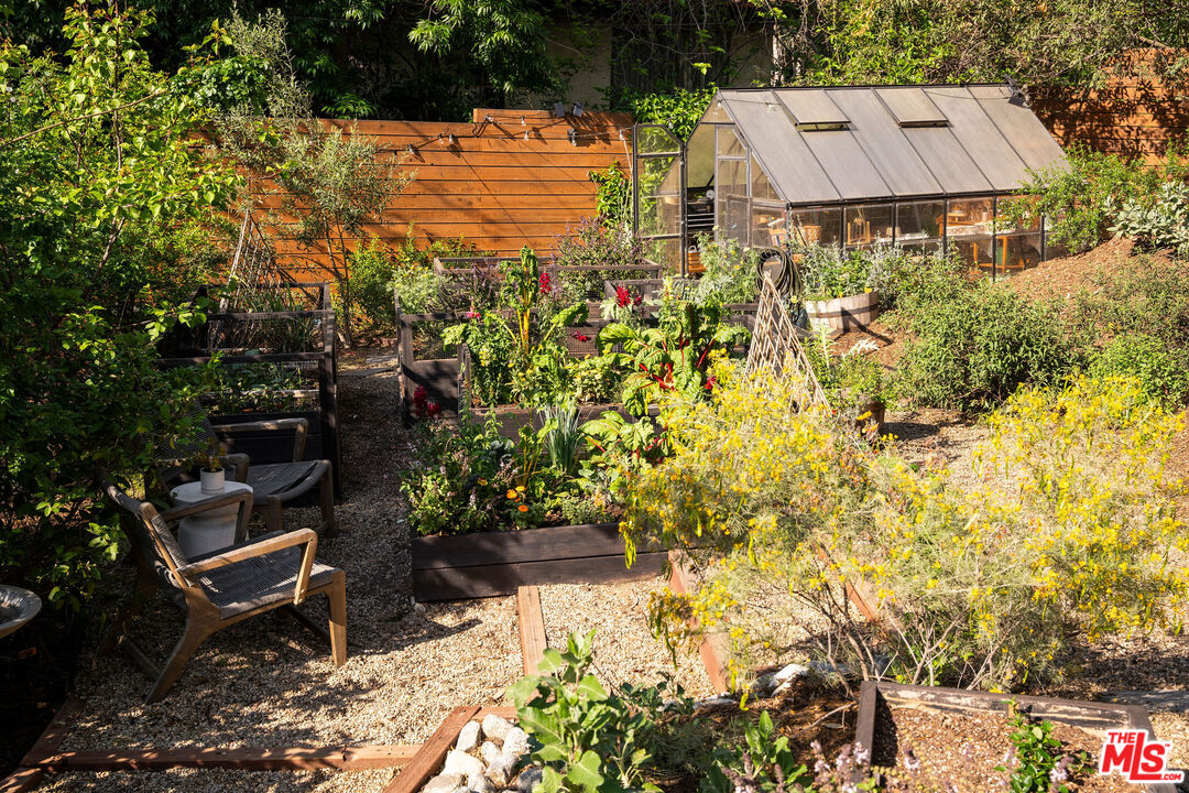 a view of yard with outdoor seating