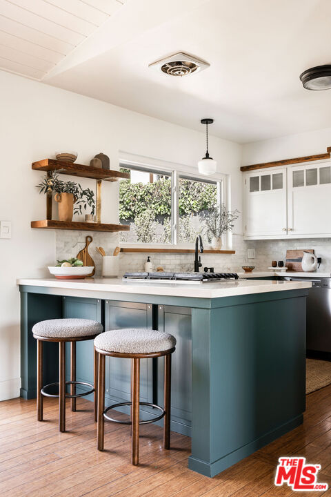258 Redwood Drive Pasadena, CA 91105 - Photo 16 of 34 a kitchen with a table and chairs in it