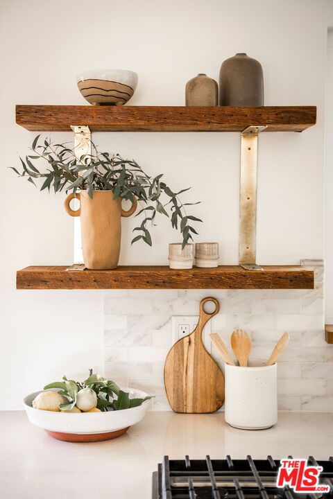 258 Redwood Drive Pasadena, CA 91105 - Photo 19 of 34 a close view of dining table with chairs