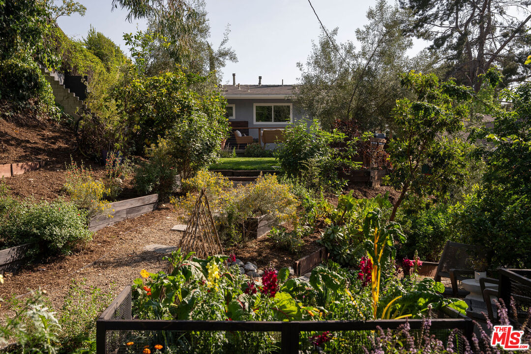 258 Redwood Drive Pasadena, CA 91105 - Photo 26 of 34 a view of a house with a flower garden