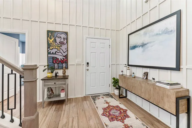 a room with cabinets and wooden floor