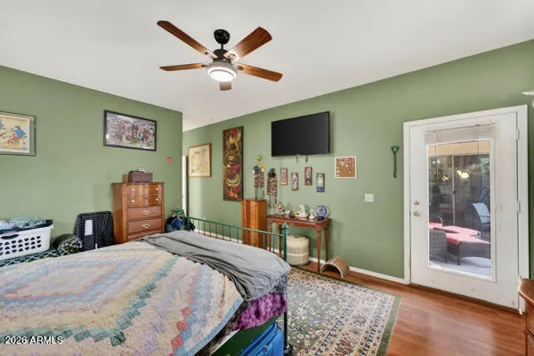a bed room with a bed and a chandelier
