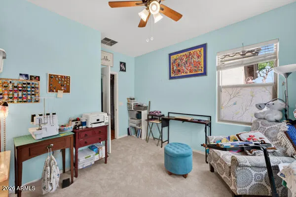 a living room with furniture and a window