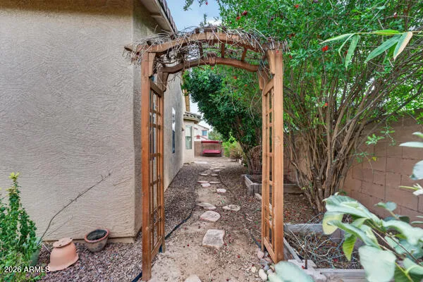 a view of a patio with couches chairs and potted plants