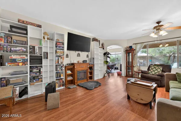 a living room with furniture and a large window