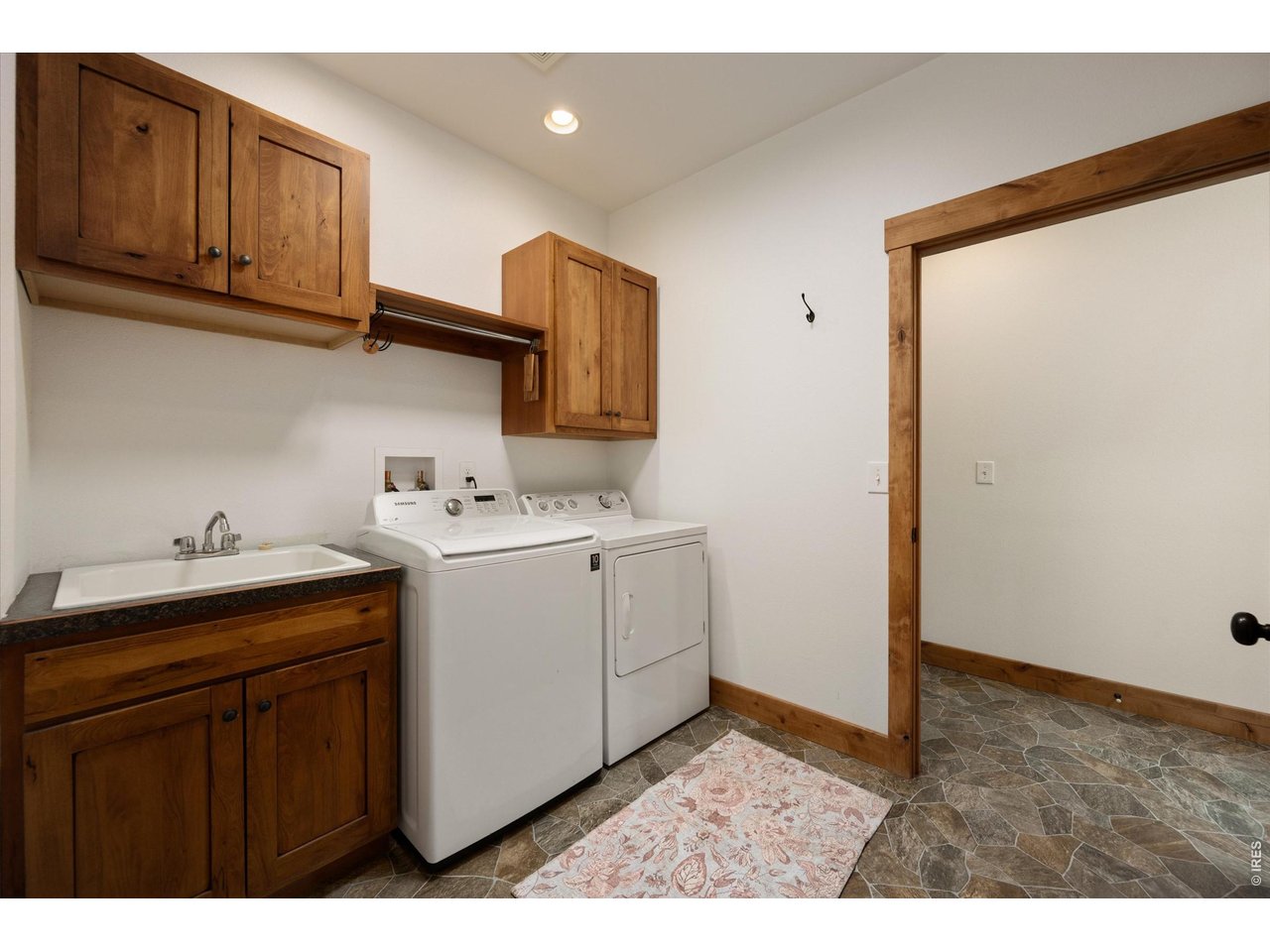 1291 Little Whale Road Bellvue, CO 80512 - Photo 23 of 43 Large laundry room also has a wash basin