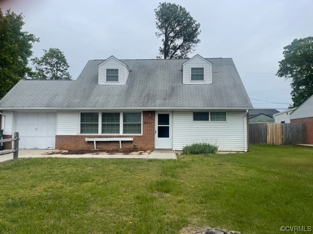 9504 Gayton Road Henrico, VA 23229 - Photo 1 of 8 a front view of a house with a yard and garage