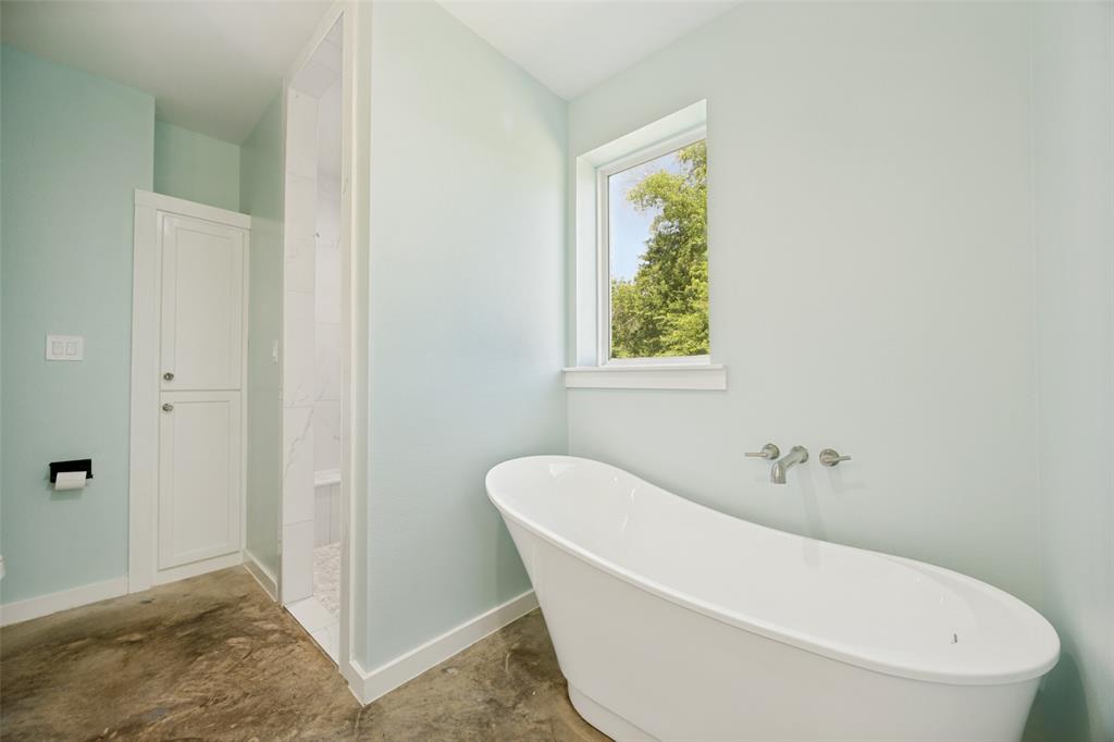 822 Private Road 7370 Point, TX 75472 - Photo 21 of 30 Freestanding soaking tub with wall-mounted fixtures