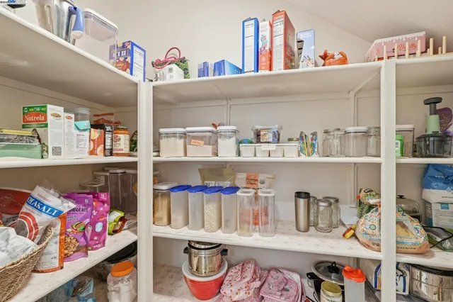 a bed room with a bed and a window