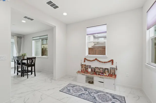 a workspace with furniture and a flat screen tv