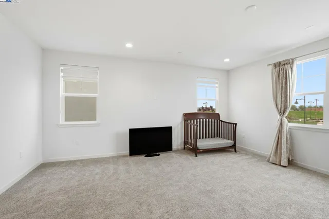 a bathroom with a sink toilet and a mirror
