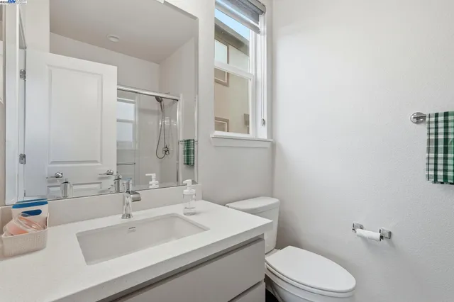a view of storage and utility room with bicycles