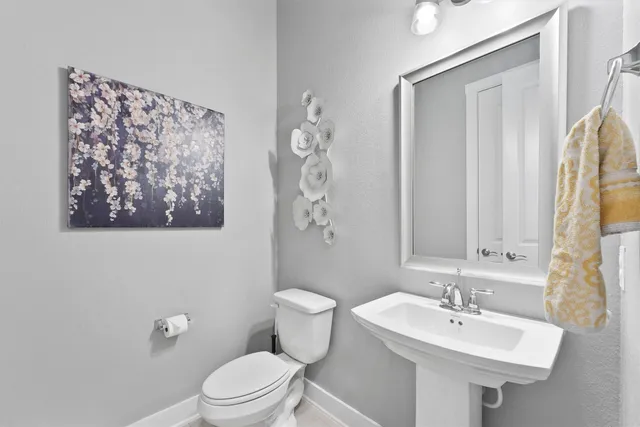 a bedroom with bed and a couch