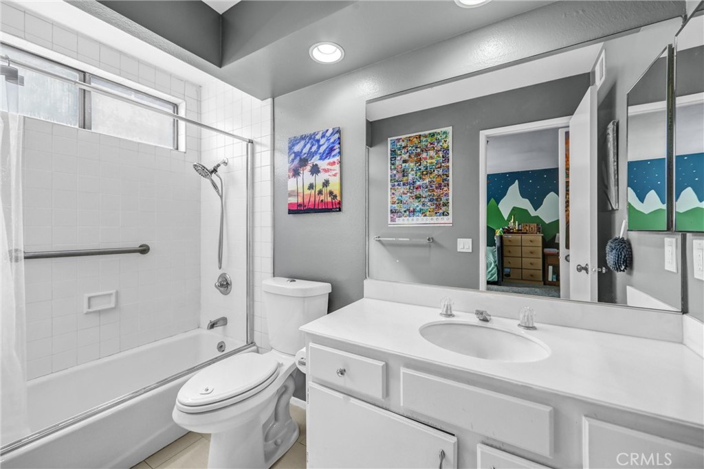984 West Riverside Drive Burbank, CA 91506 - Photo 27 of 35 a bathroom with a sink toilet and shower