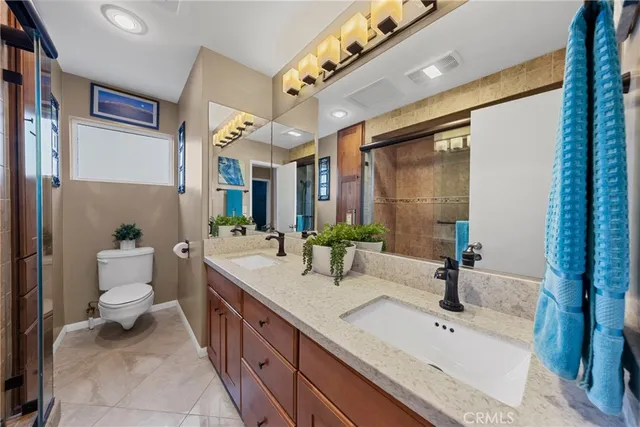 a hallway with sliding door and stairs