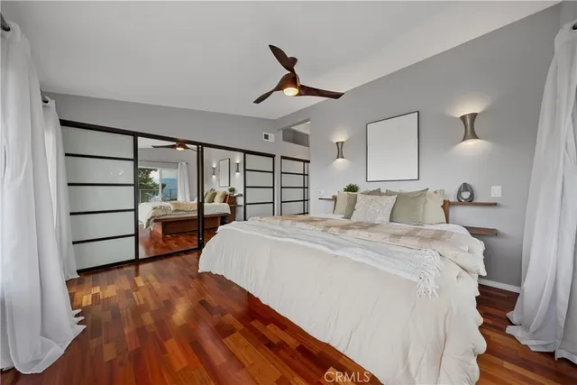 a utility room with cabinets washer and dryer