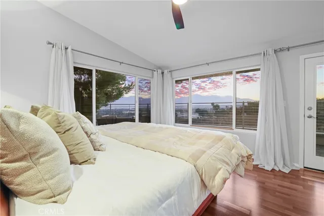 a view of a garden with a building in the background