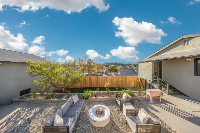 a front view of a house with a yard and a garage