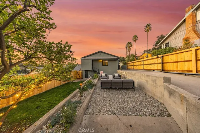 a view of a balcony with chairs