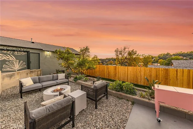 a view of a terrace with sitting area