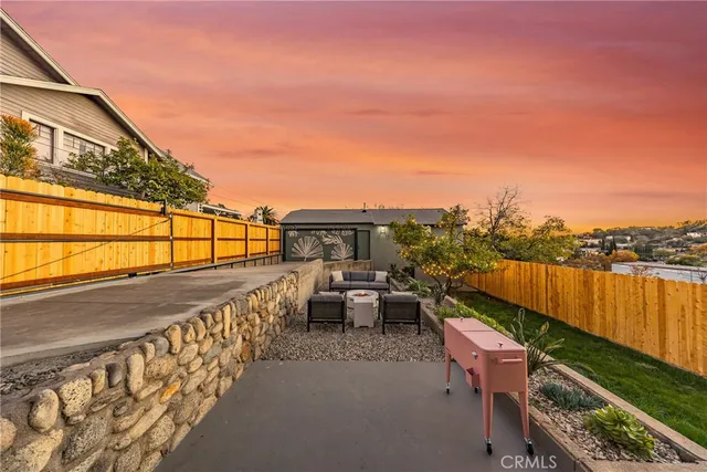 a view of a backyard of the house