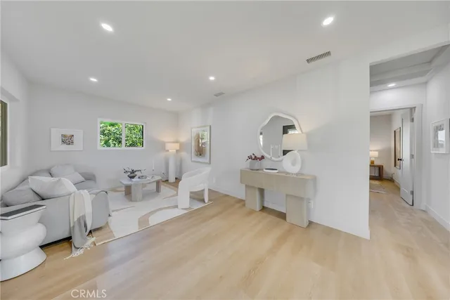 a living room with furniture and window