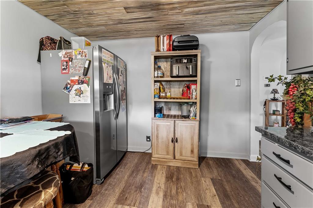 210 Hopwood Fairchance Road Uniontown, PA 15401 - Photo 19 of 28 a view of a kitchen with fridge and wooden floor