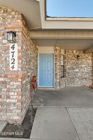 a front view of a house with a garage
