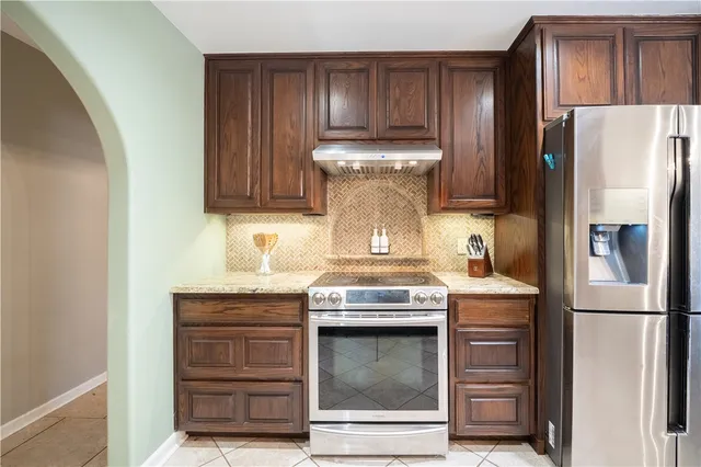 a room with a bed and window