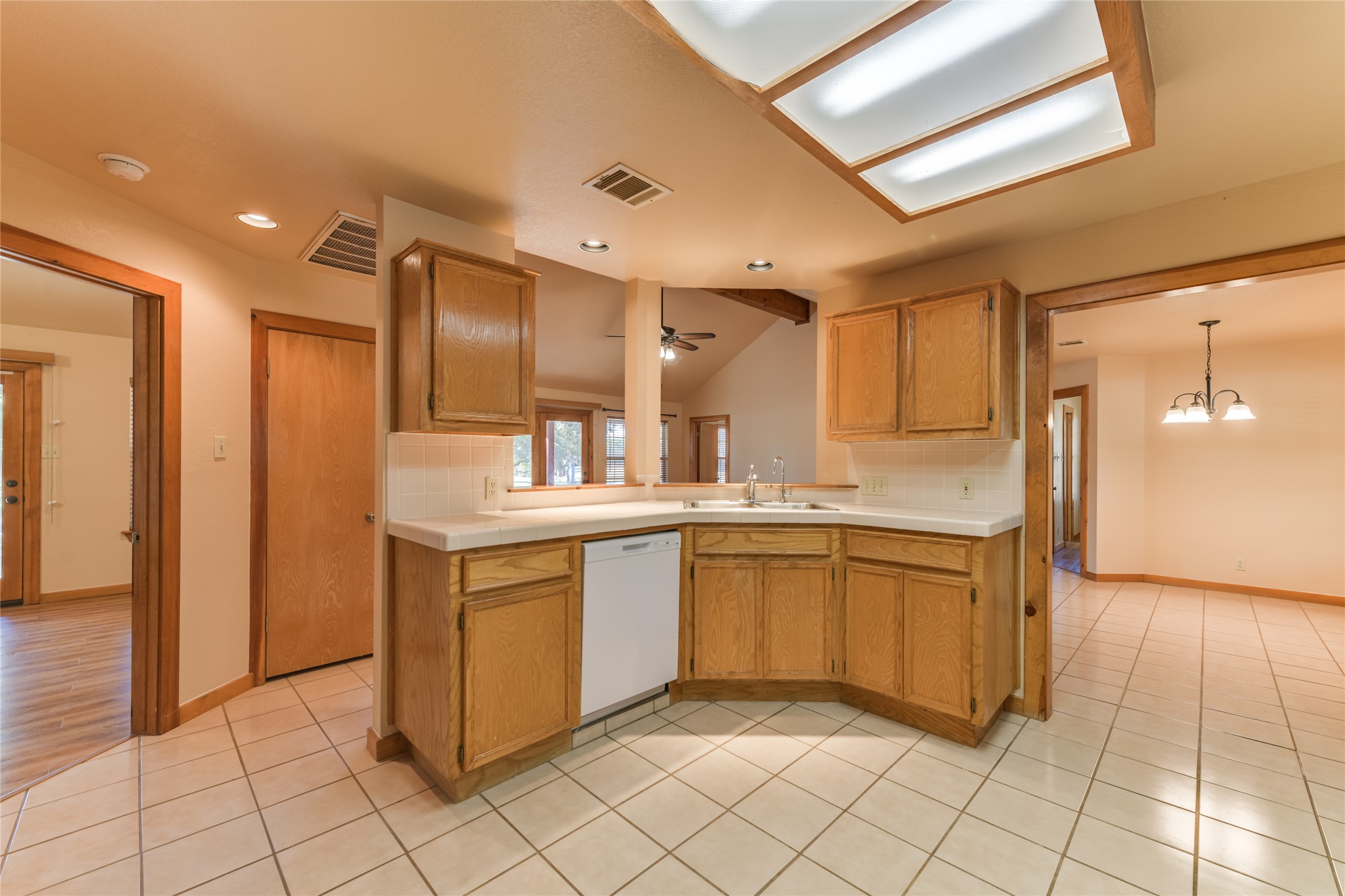 1201 Sandy Point Road Wimberley, TX 78676 - Photo 12 of 40 a large bathroom with a sink and a large mirror