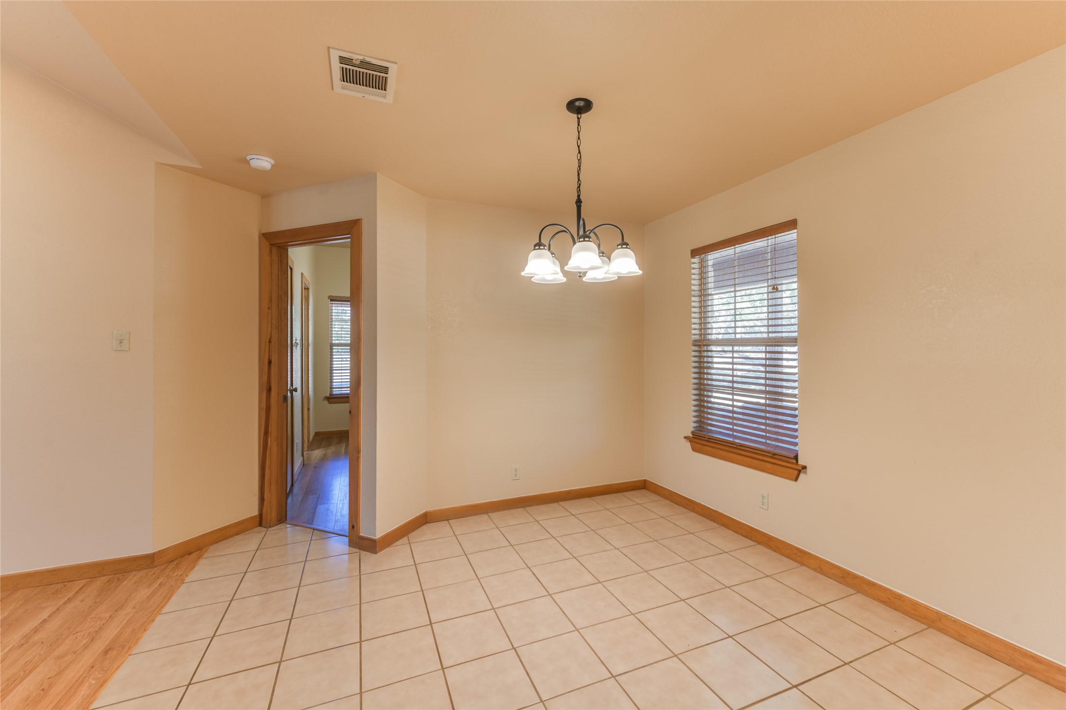 1201 Sandy Point Road Wimberley, TX 78676 - Photo 16 of 40 a view of an empty room with a window