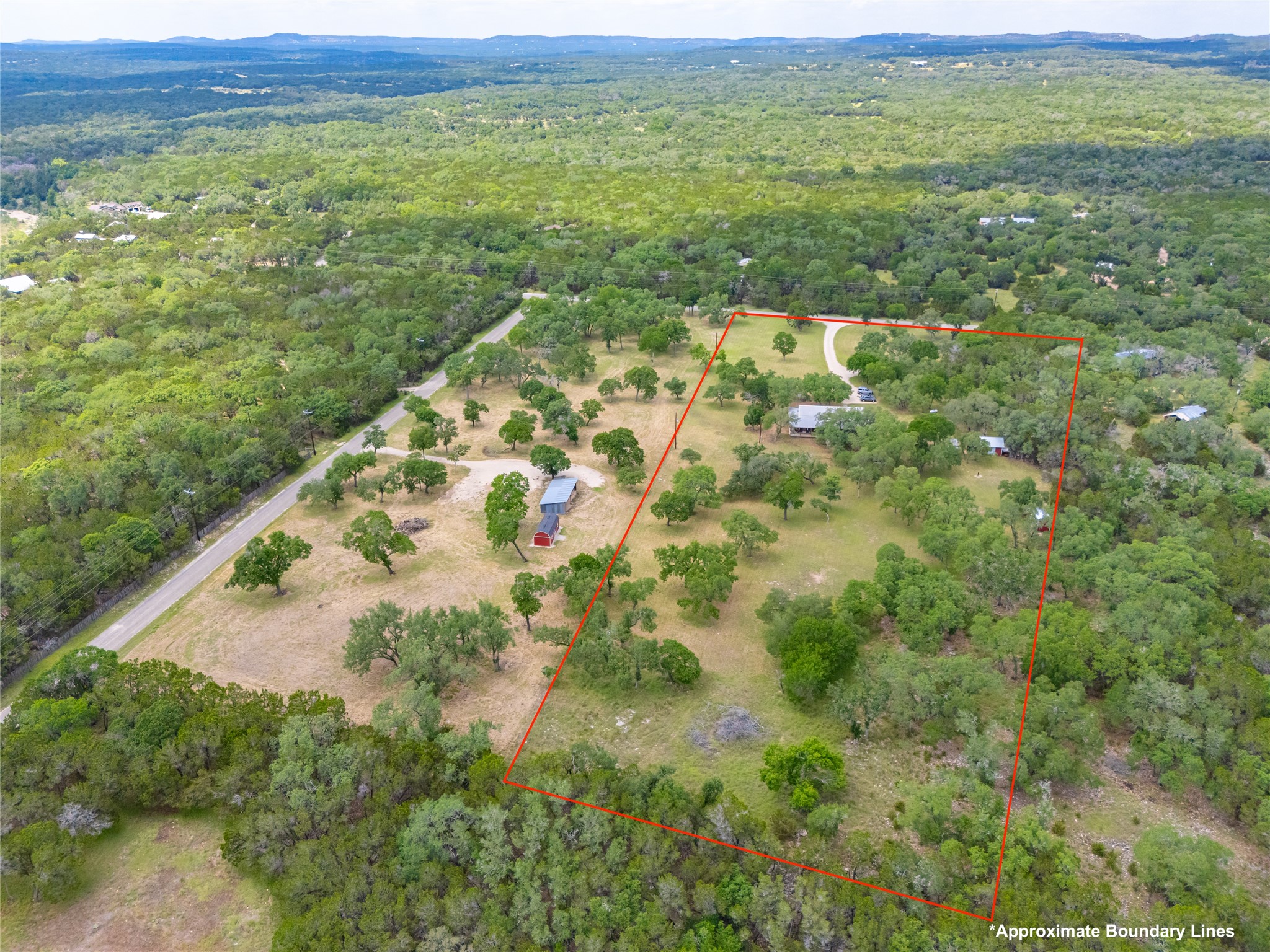 1201 Sandy Point Road Wimberley, TX 78676 - Photo 32 of 40 a view of a field with an ocean