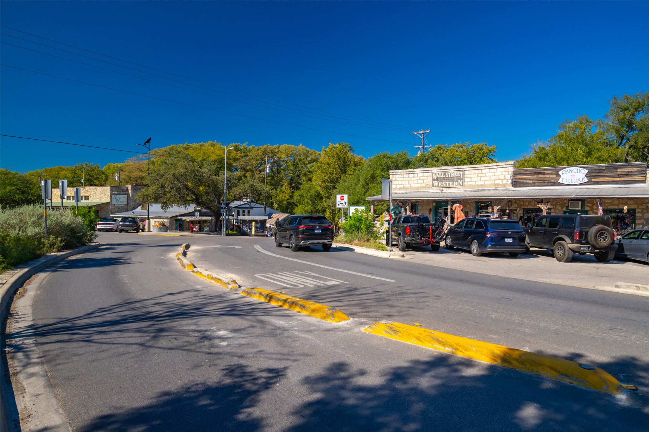 1201 Sandy Point Road Wimberley, TX 78676 - Photo 36 of 40 a view of building with car parked