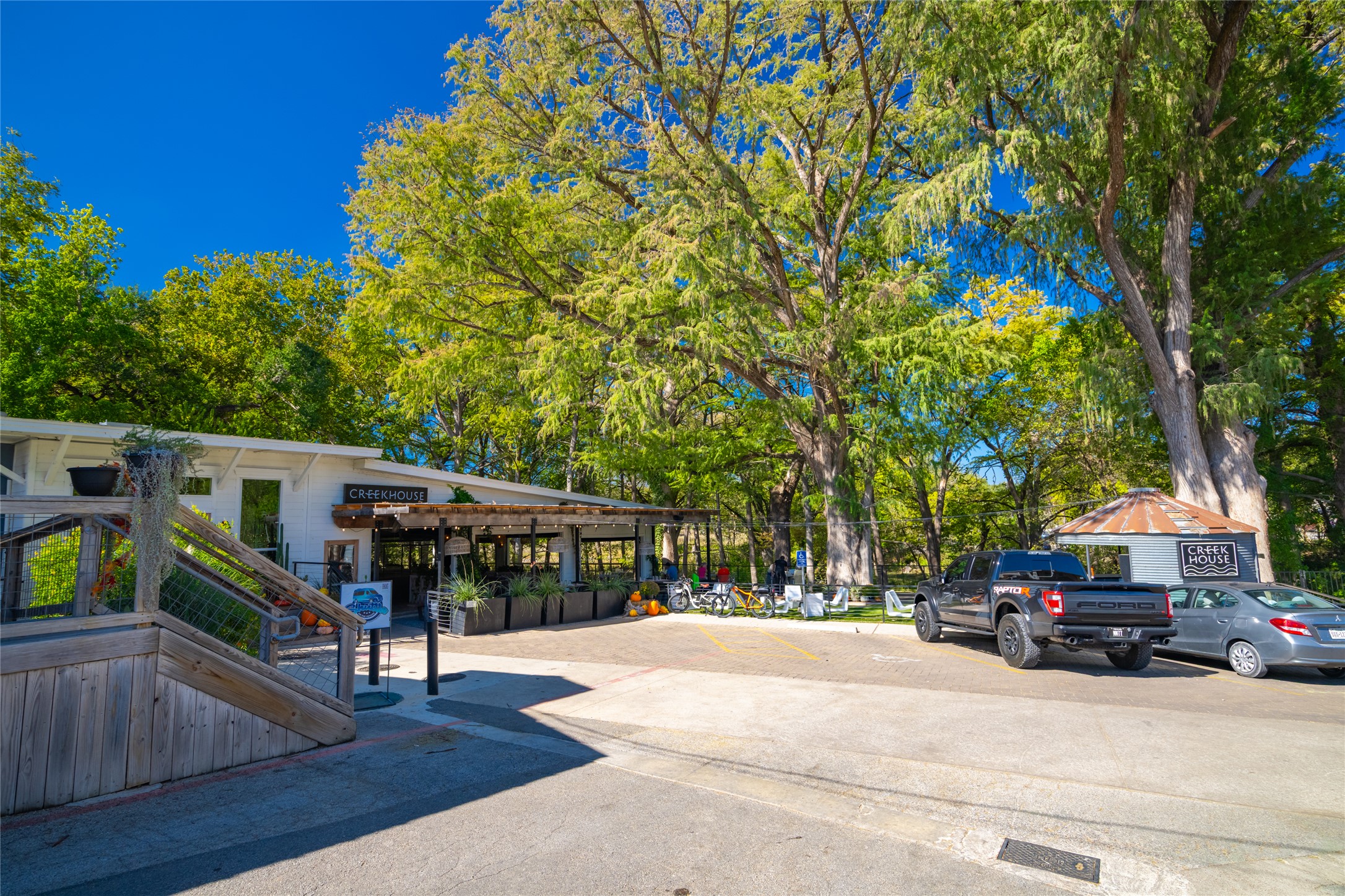 1201 Sandy Point Road Wimberley, TX 78676 - Photo 38 of 40 a view of house with outdoor space and deck