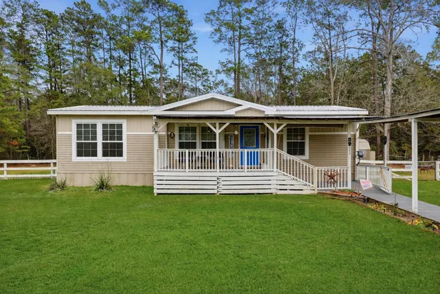 a house view with a garden space
