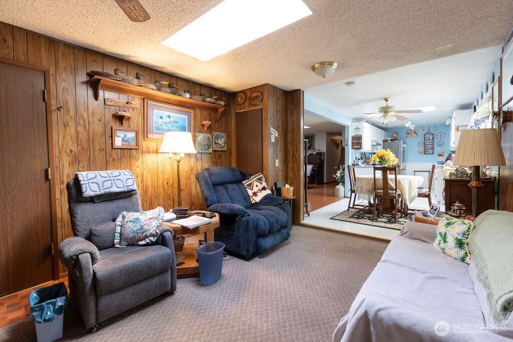 371 Flora Place Forks, WA 98331 - Photo 20 of 40 a living room with furniture and wooden floor