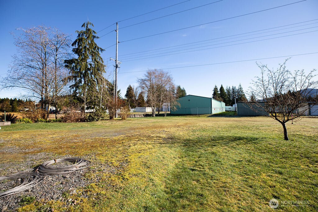 371 Flora Place Forks, WA 98331 - Photo 31 of 40 a garden view with a fountain