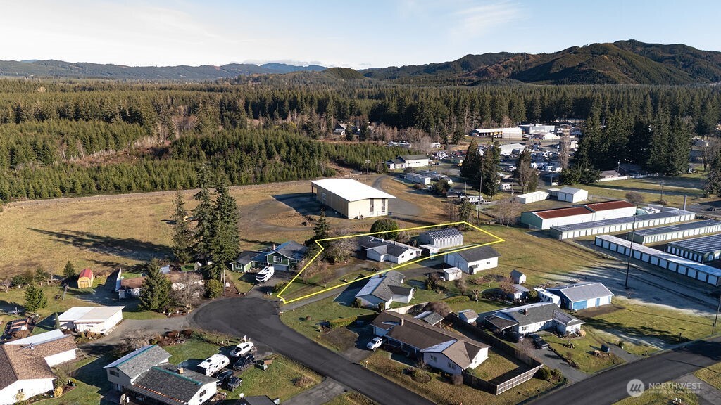 371 Flora Place Forks, WA 98331 - Photo 33 of 40 an aerial view of a house with pool