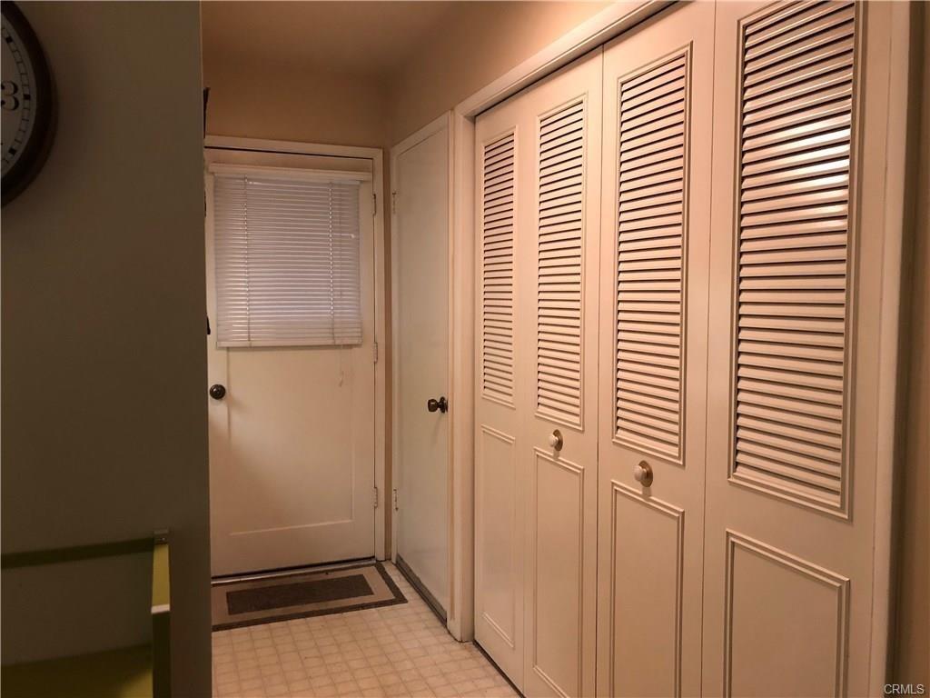 42652 Springwood Road Oakhurst, CA 93644 - Photo 7 of 12 Back porch door. Washer and dryer behind closet doors.