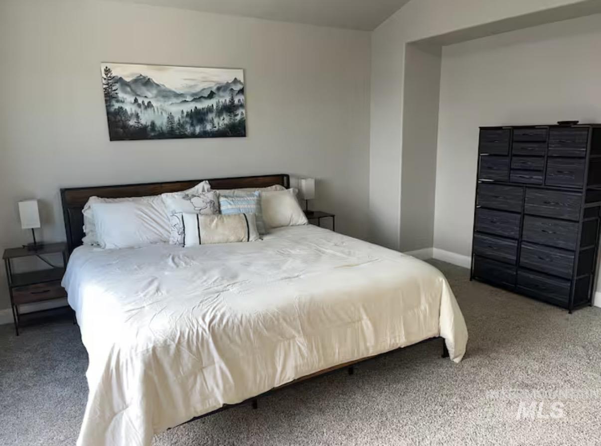 723 Stallion Springs Way Middleton, ID 83644 - Photo 19 of 50 Bedroom featuring carpet floors and baseboards