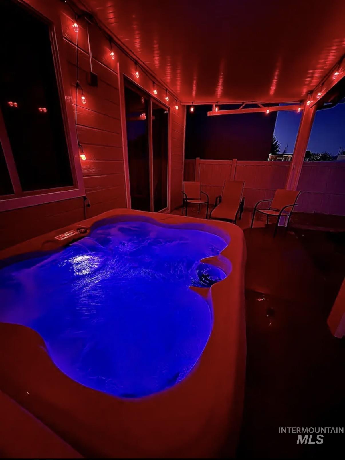 723 Stallion Springs Way Middleton, ID 83644 - Photo 39 of 50 View of pool with a hot tub